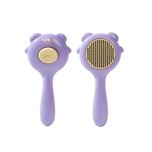 Bear-shaped cat grooming brush with self-cleaning button in purple and yellow colors