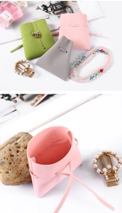 Macro detail of high-quality microfiber suede jewelry pouches with drawstring closures