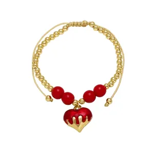 Handmade 18k gold plated beaded bracelet featuring red heart charms and cherry beads