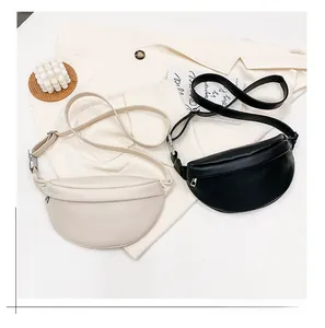 Minimalist cream and black leather crescent fanny packs with adjustable shoulder straps