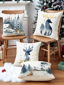 Winter pillow covers with fox and reindeer prints on a wooden chair and faux fur rug
