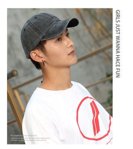 Side view of grey washed cotton baseball cap on male model in outdoor natural light