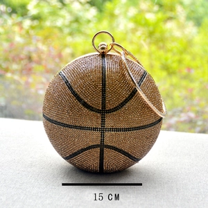 Detail of 15cm gold basketball evening bag with sparkling rhinestones and metal handle