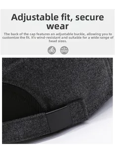 Détail de la boucle réglable et de la texture en laine grise de la casquette d'hiver