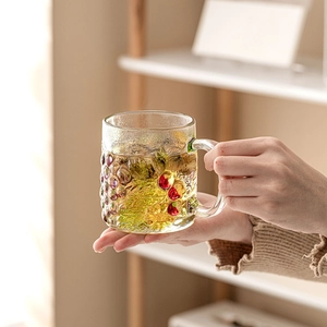 Hand-painted glass mug with bubble texture and colorful dots for coffee or tea