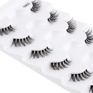 Close-up of 5 pairs of natural black half eyelashes YK405 on a white plastic tray