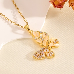 Elegant gold bow necklace with yellow cat eye stones and sparkling zircons for women