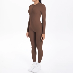 Deep brown long sleeve one-piece yoga jumpsuit with front zipper and slim fit design