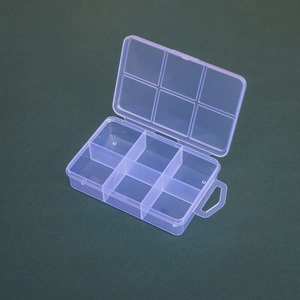 Detail of 6-compartment transparent storage box with integrated lid and hanging hole