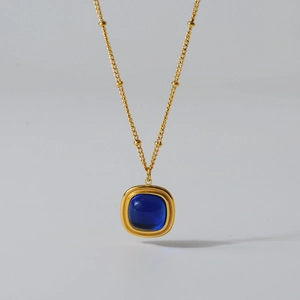 Gold titanium steel necklace with a square deep blue natural crystal stone pendant