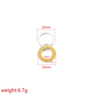 Polished stainless steel round key ring and gold circular charm with 25mm diameter