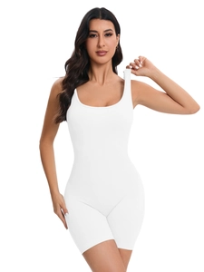 Detailed view of white ribbed fabric texture on seamless yoga romper with U-neckline
