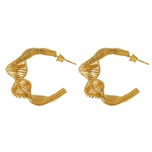 Close-up of golden spiral hoop earrings featuring detailed metal wire wrap design