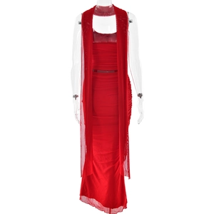 Detail of red mesh bodycon maxi dress with matching neck-tie shawl and slim-fit texture
