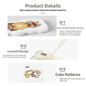 Detail of cartoon wood pulp sponge with convenient hanging loop for kitchen cleaning