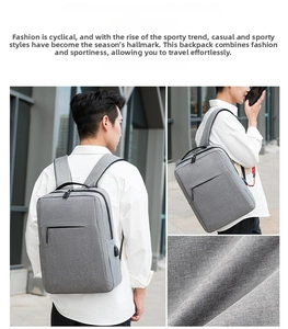 Detail of water-resistant fabric and side USB charging port on the gray laptop backpack