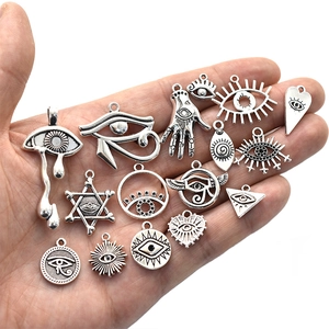 Set of 16 vintage silver alloy charms featuring Eye of Horus and spiritual symbols