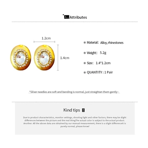 Detail specifications of oval gold earrings with rhinestones showing size and material info