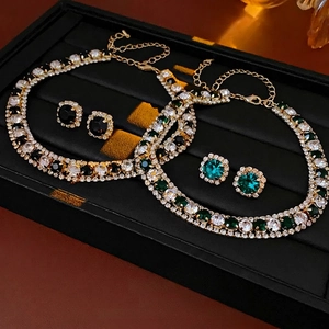 Luxurious gold-plated necklace and earring set with emerald green and black rhinestones