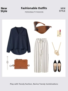Flat lay of Y2K style oversized sunglasses with trendy clothing and fashion accessories