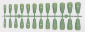 Detail view of sage green glossy coffin fake nails on sprue showing 24 pieces set