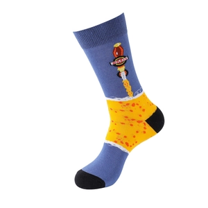 Detail of blue and yellow cotton mid-calf socks featuring a knitted beer theme design
