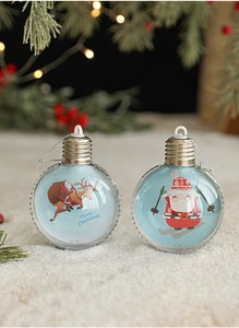 Detail of bulb-shaped Christmas ornament with Santa Claus illustration on snowy background