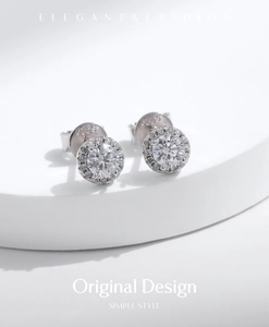 Detailed macro view showing the 925 silver hallmark on sparkling round moissanite earrings