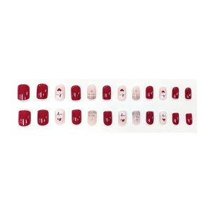 Short square Christmas press-on nails featuring red glitter and cute snowman nail art
