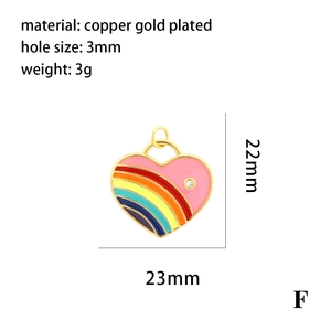Detail shot of a 23mm rainbow heart pendant with 18K gold plating and sizing specifications