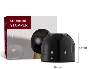 Technical drawing of a black champagne stopper showing 39mm width and 32mm height details