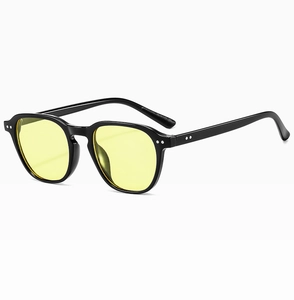 Detail of retro small frame sunglasses with black frame and translucent yellow lenses
