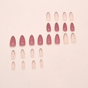 Almond shaped press on nails in translucent nude and dusky rose pink glossy finish