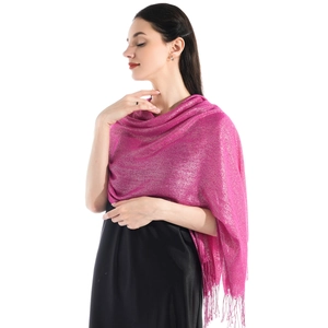 Close-up of pink shawl fabric showing shimmer texture and elegant fringe detailing