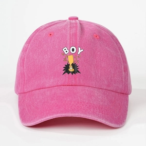 Detailed macro view of pink washed cotton baseball cap featuring BOY trophy graphic