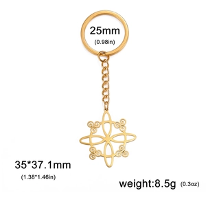 Detailed close-up of golden stainless steel witch knot keychain with size measurements