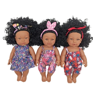 Realistic 18-inch black baby dolls set in floral outfits with matching headbands