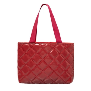 Glossy red quilted tote bag with fabric handles on a white background for casual daily use