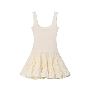 Elegant off-white knit camisole dress featuring a layered tiered ruffle skirt design
