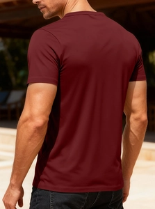 Close-up of wine red men's V-neck T-shirt showing athletic fit and breathable fabric