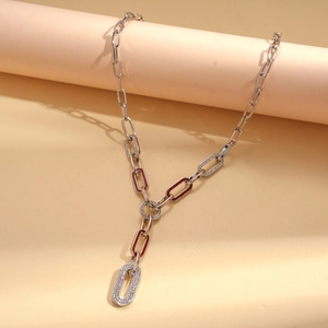 Silver oval chain necklace with sparkling diamonds and brown enamel inlay detail