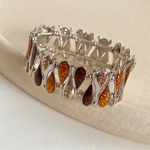 Vintage silver wide bracelet with amber resin teardrops and sparkling crystals