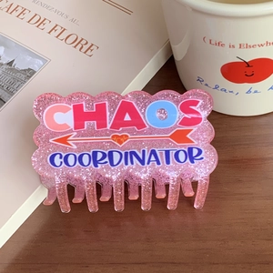 Pink glitter acrylic hair claw clip with heart and Chaos Coordinator letter print
