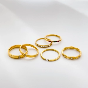 Set of 6 minimalist gold stainless steel rings with colorful zircon and star motifs