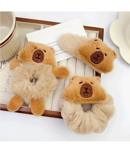 Three-piece set of plush brown bear hair accessories including hair ties and clips