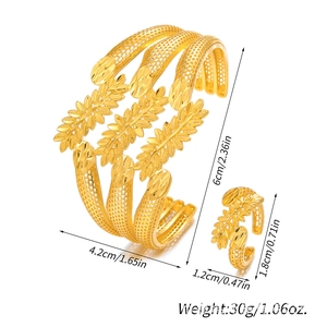 Detailed view of gold hollow cuff bracelet and ring set with mesh texture dimensions