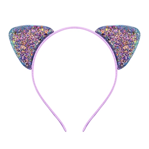 Close-up of sparkling multicolor sequins on purple cat ear headband for kids