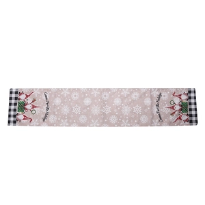 Christmas gnome table runner with white snowflakes and red holiday dwarf illustrations