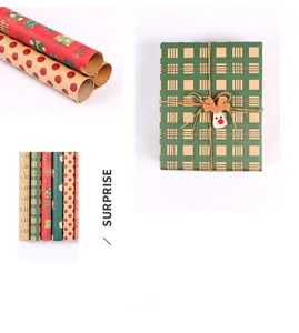 Detail of vintage Christmas kraft wrapping paper with red dots and plaid patterns
