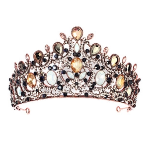Close-up of rose gold crown featuring amber champagne stones and sparkling crystals